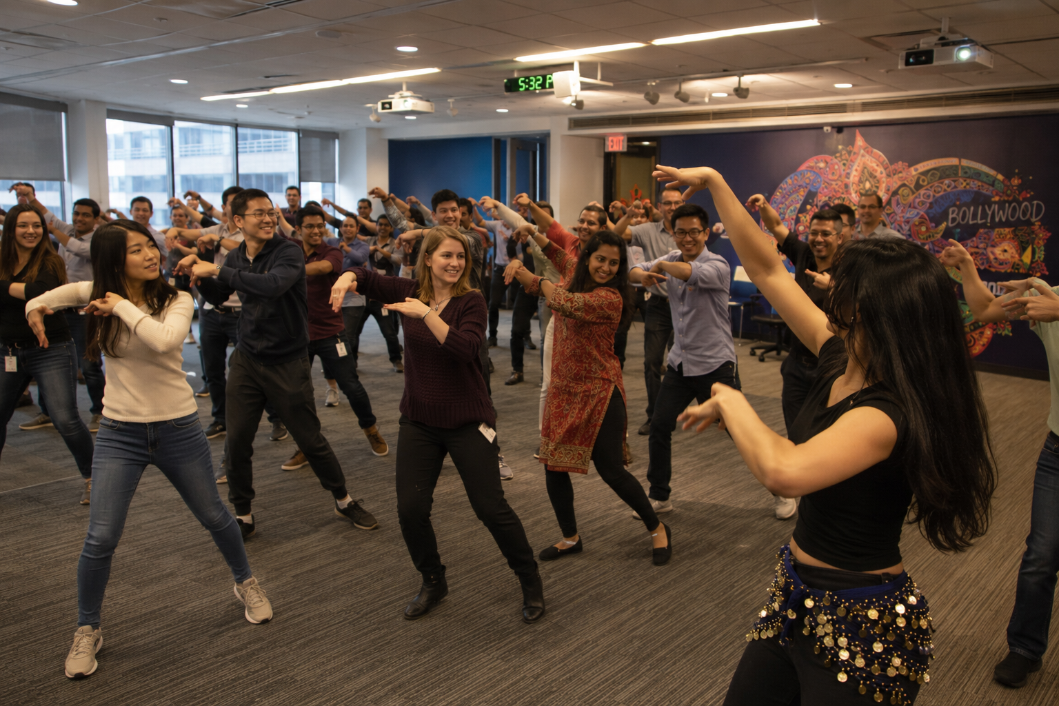 Corporate team learning a Bollywood dance workshop
